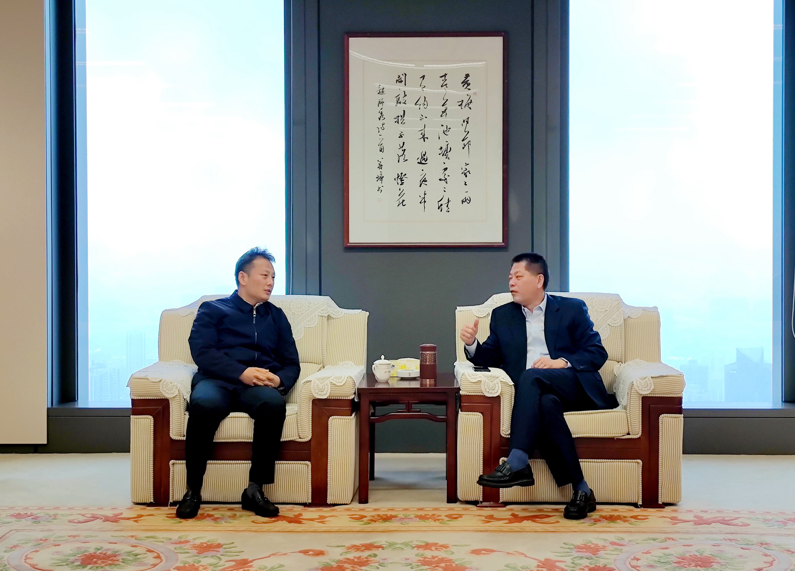 武岳彪与广晟集团党委书记、董事长刘卫东座谈交流.jpg